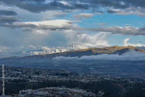 Sunset in the Inter-Andean Valley from where the Cayambe volcano is illuminated. Quito, Ecuador.