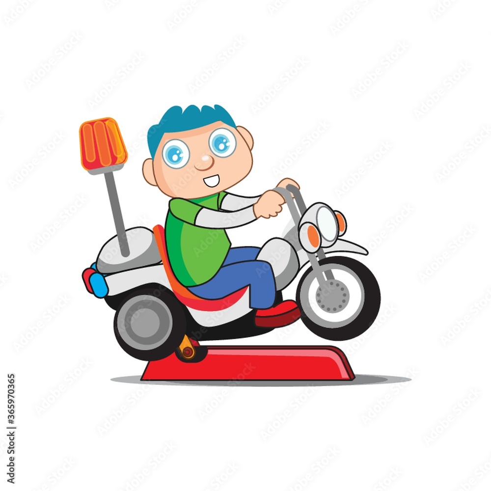 boy on toy motorbike boy on toy motorbike