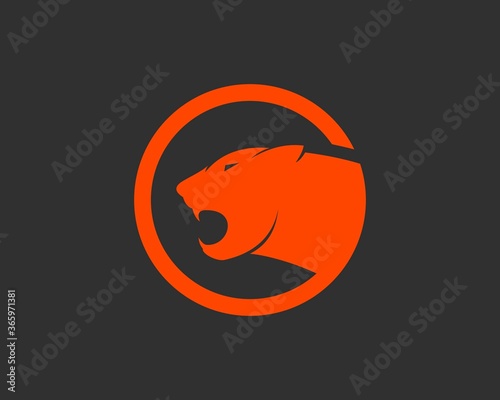 Orange circle shape with panther inside