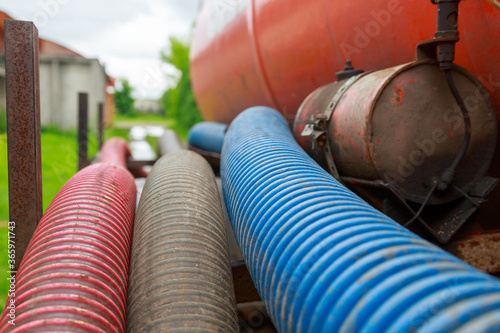 Pipe of a Sewage Pumping Machine. Providing Sewer Cleaning Service Outdoor