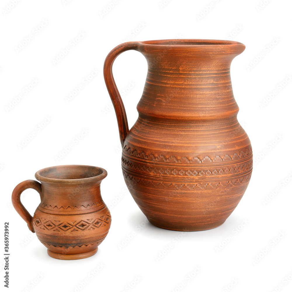 Clay jug and mug isolated on white background.