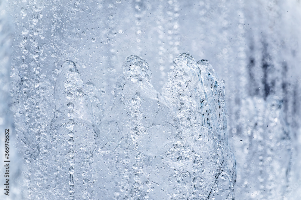 Obraz premium Splashes of water against light background.