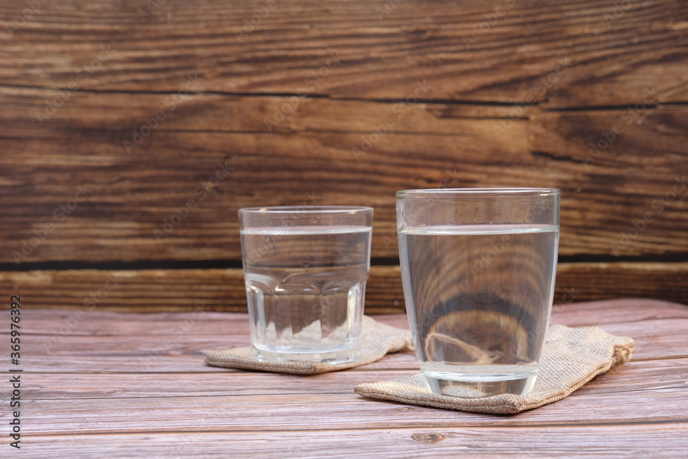 Glasses of water on the table background and space for text Glasses of water on the table background and space for text