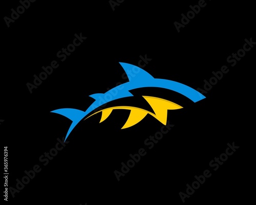 Blue and yellow shark with lightning inside