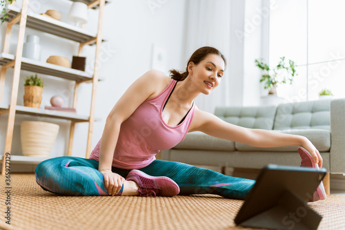 woman doing exercises at home