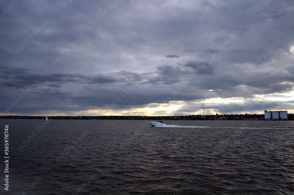 storm clouds over the river