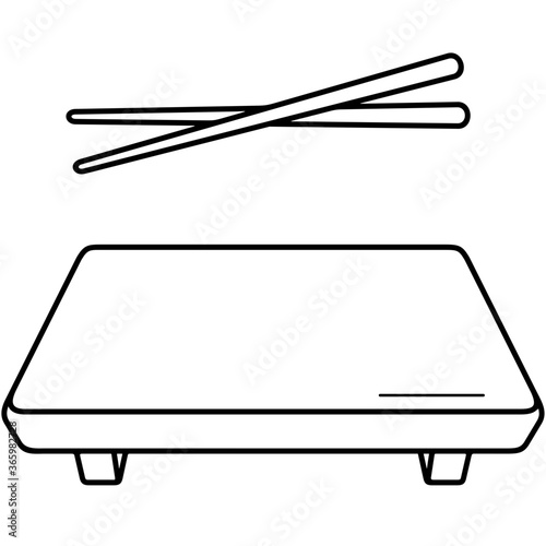Bamboo serving plate with sushi chopsticks