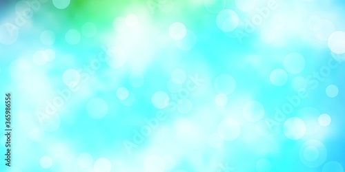 Light Blue, Green vector backdrop with dots. Abstract decorative design in gradient style with bubbles. Pattern for websites.