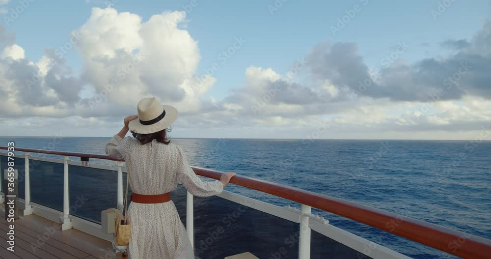Young passenger on a cruise ship. Shot on Black Magic Cinema Camera Young passenger on a cruise ship. Shot on Black Magic Cinema Camera