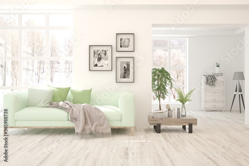 Wallpaper Mural White living room with sofa and winter landscape in window. Scandinavian interior design. 3D illustration Torontodigital.ca