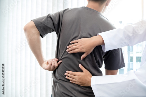 Male patients consulted physiotherapists with Low back pain for examination and treatment. Rehabilitation physiotherapy concept