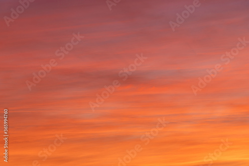 Fototapeta Naklejka Na Ścianę i Meble -  Red orange sunset coloured sky.