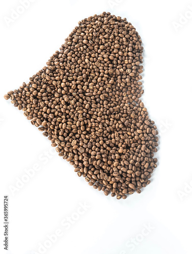 heap of coffee beans isolated on white background from top view.