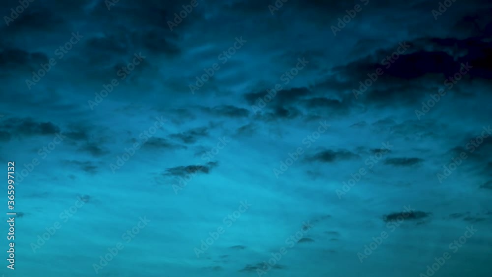 Movement of clouds in the evening and night sky. Night sky with silvery clouds. two layers of clouds move at different speeds, accelerated video Movement of clouds in the evening and night sky. Night sky with silvery clouds. two layers of clouds move at different speeds, accelerated video