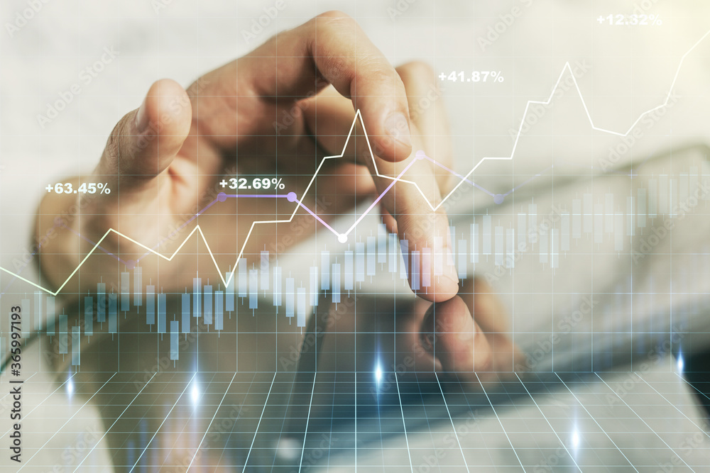Multi exposure of abstract creative financial graph with finger presses on a digital tablet on background, forex and investment concept Multi exposure of abstract creative financial graph with finger presses on a digital tablet on background, forex and investment concept