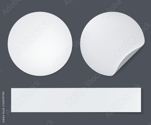 Blank white stickers straightened and with folded corner