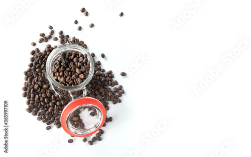 glass bottle with coffee beans isolated on white background.