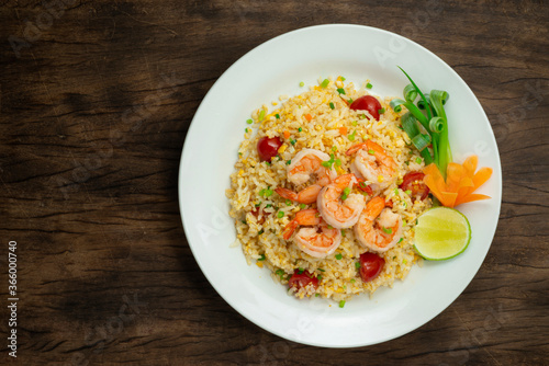 Fried Rice with Shrimps and tomatoesThai Food popular dish of Asian decorate carved