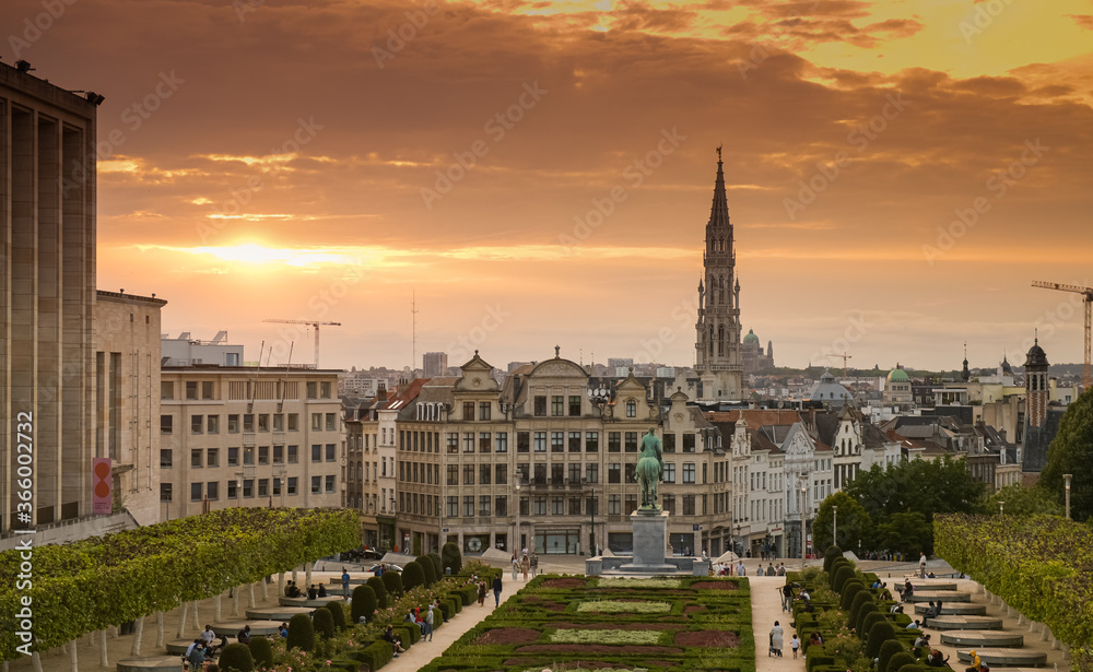 Naklejka premium Brussels / Belgium - 2020: Sunset light on the streets of the city