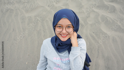 Asian hijab girl is in the desert, Gumuk Pasir, Yogyakarta photo