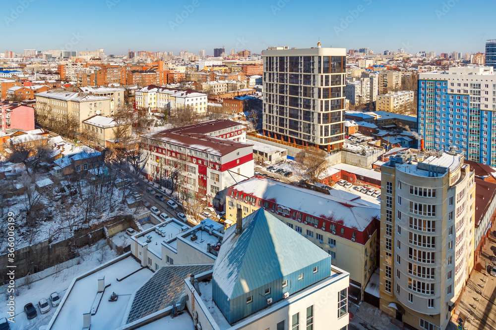 The aerial wintertime landscape of the city with residential multistory buildings. Rostov-on-Don, Russia