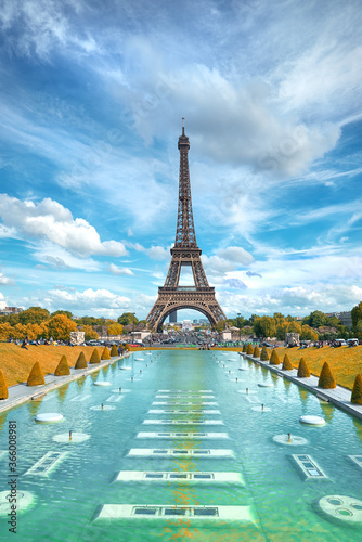 Photography Eiffel tower, symmetrical front view from Trokadero on a bright day in Autumn