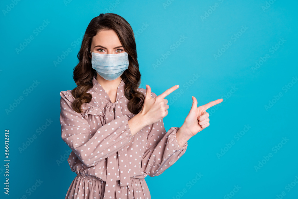 Portrait of her she nice-looking attractive lovely wavy-haired girl wearing mask demonstrating solution stop contagious viral pneumonia sickness illness disease mers cov isolated blue color background Portrait of her she nice-looking attractive lovely wavy-haired girl wearing mask demonstrating solution stop contagious viral pneumonia sickness illness disease mers cov isolated blue color background