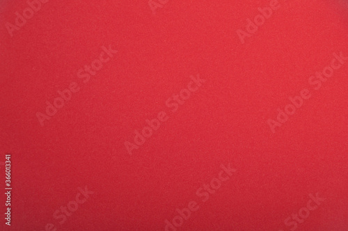 Red paper with texture.