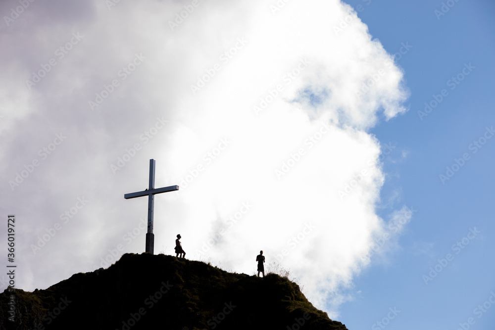 People summit a Peak in Bavaria mountains, South Germany. Europe People summit a Peak in Bavaria mountains, South Germany. Europe