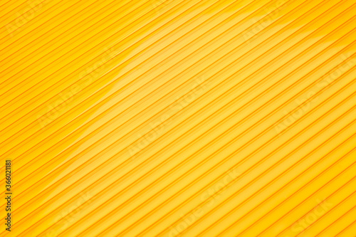 Colored plastic sheet panel image. Bright yellow translucent roofing sheet texture, close up. Hollow Polycarbonate Sheet Roofing Panel Colored Plastic Production. photo