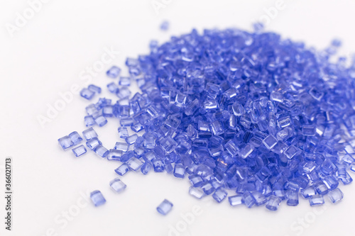 Blue Color UV policarbonat raw materials granules close up. Hollow Sheet Panel Plastic Production