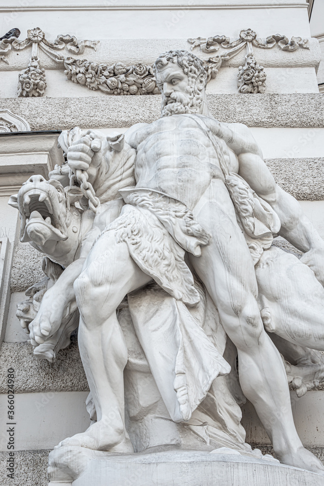 Statue of Hercules fighting Cerberus, a multiheaded dog beast that