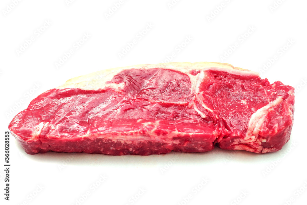One fresh juicy striploin steak on white isolated background, Meat industry product.