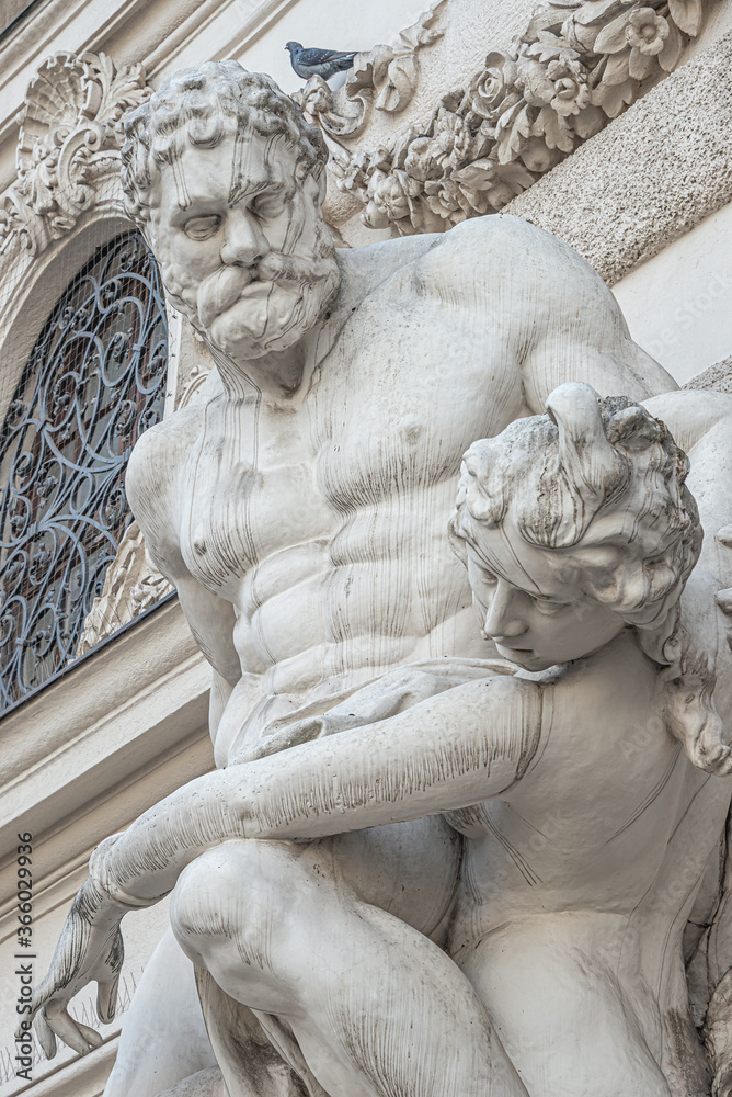 Statue of fight of Hercules with a club and Hippolyte, and Amazonian queen from Classical Greek Mythology, Hofburg Palace, outdoor, Vienna, Austria, details, closeup