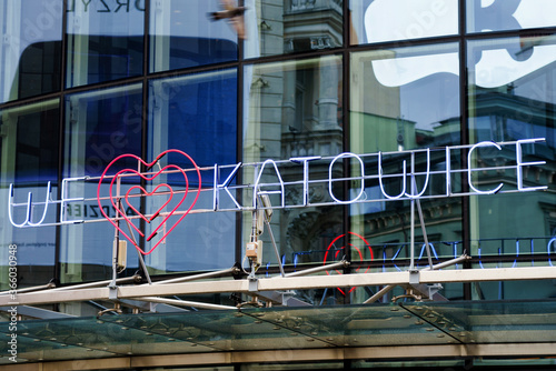 KATOWICE, POLAND - OCT 4, 2018: We love Katowice illuminated neon sign above the entrance to Galeria Katowicka department store photo