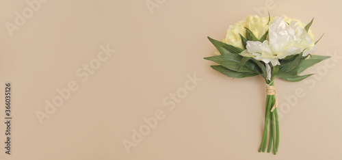 Bouquet of flowers on a beige background