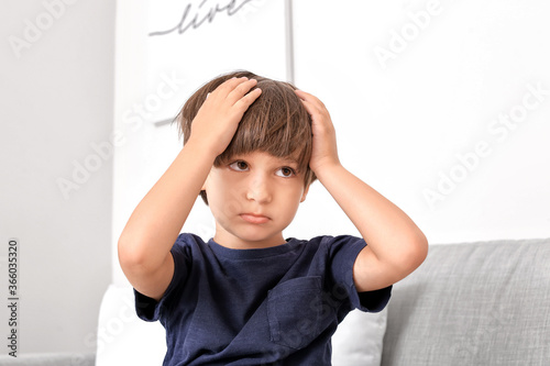 Little boy suffering from h...