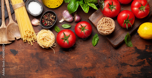 Italian cuisine ingredients. Tomatoes, pasta, herbs and spices