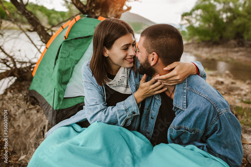 Happy Man and woman on a romantic camping vacation. © Mediteraneo