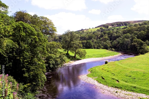 Reflections by the River Wharfe, in Wharfedale, Skipton, West Yorkshire, England.