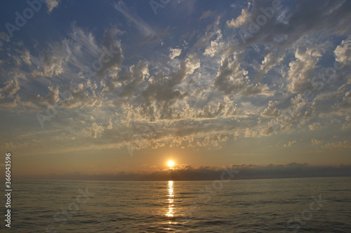 sunset over the sea © nizami
