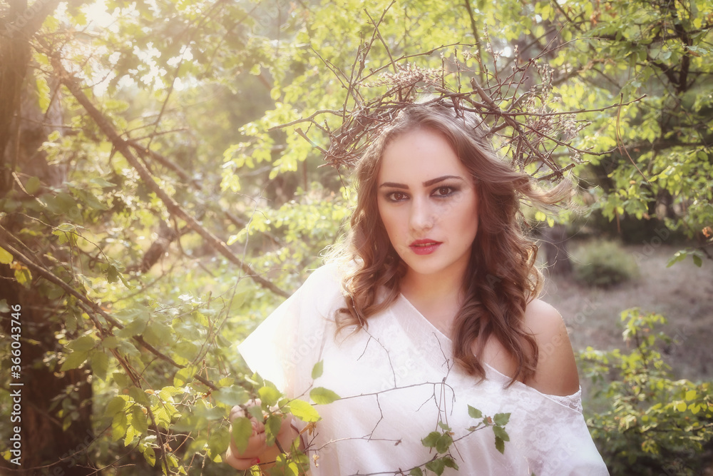 Beautiful mystery gothic woman in long white dress in autumn forest. Beautiful mystery gothic woman in long white dress in autumn forest.
