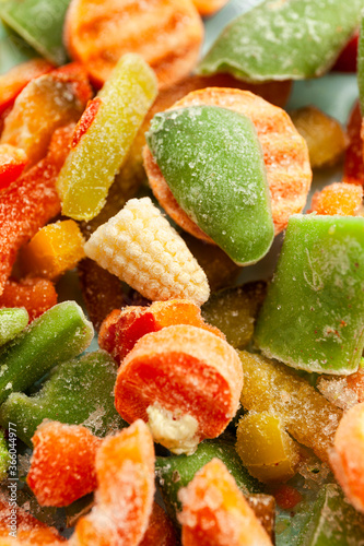 Multi-colored frozen vegetables, summer vitamin set. Healthy food in winter.