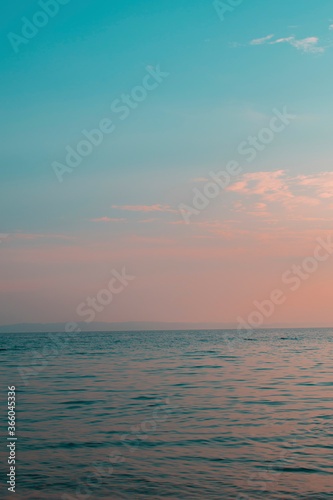 Tropical ocean and sky blue and pink gradient. Wallpaper,  copy space.