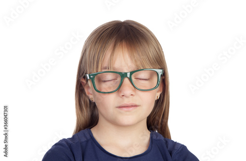 Tired blond girl with glasses sleeping