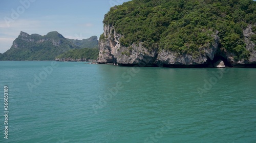 Group of Islands in ocean at Ang Thong National Marine Park near touristic Samui paradise tropical resort. Archipelago in the Gulf of Thailand. Idyllic turquoise sea natural background with copy space