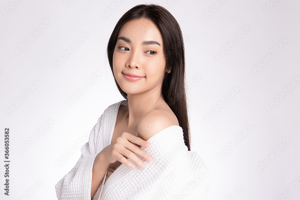 Beautiful Young Asian Woman touching her body with fresh Healthy Skin, isolated on white background, Beauty Cosmetics and Facial treatment Concept. Beautiful Young Asian Woman touching her body with fresh Healthy Skin, isolated on white background, Beauty Cosmetics and Facial treatment Concept.
