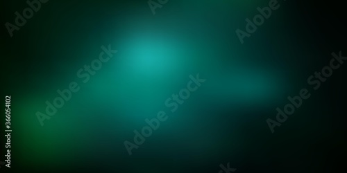Dark green vector blurred texture.