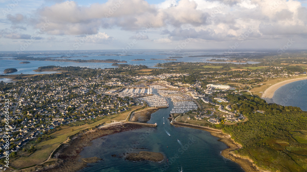 Parallel drone view of a city border by the sea, arzon, morbihan