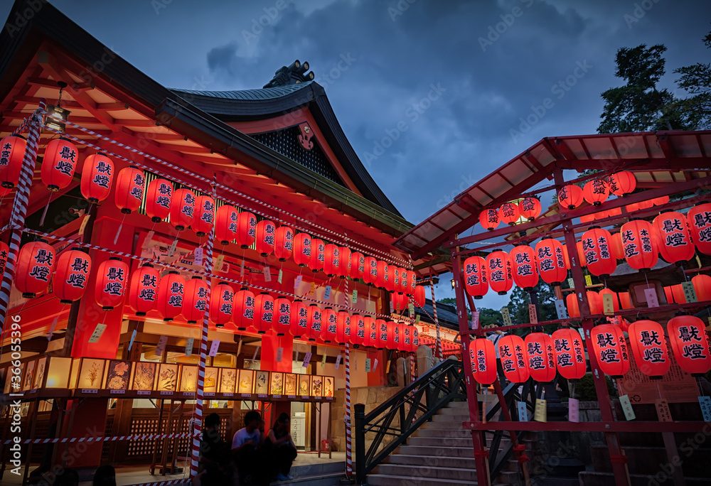 Fushimi Inari Taisha shrine illuminated with red lanterns in Motomiya  Festival in Kyoto, Japan Stock Photo | Adobe Stock